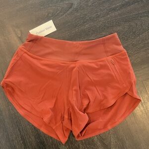 Outdoor Voices Women's Athletic Shorts in Rust